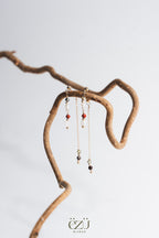 Les boucles d'oreilles -  Duo